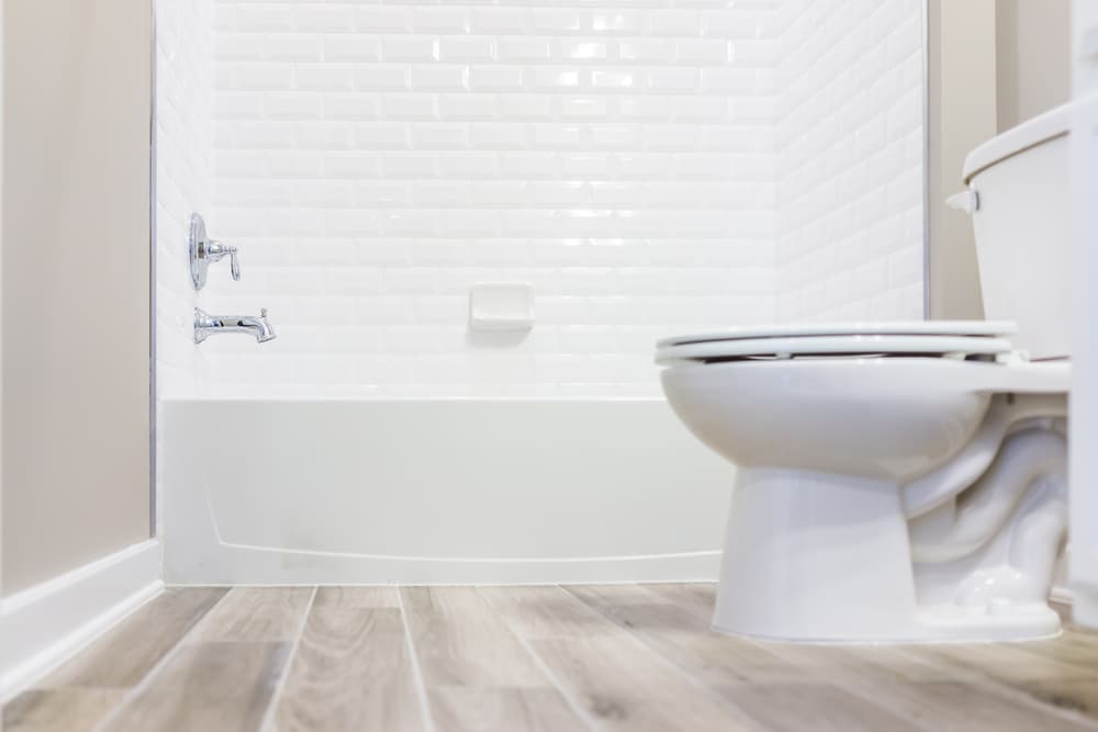 Toilet Backing Up Into Shower? Here's What to Do
